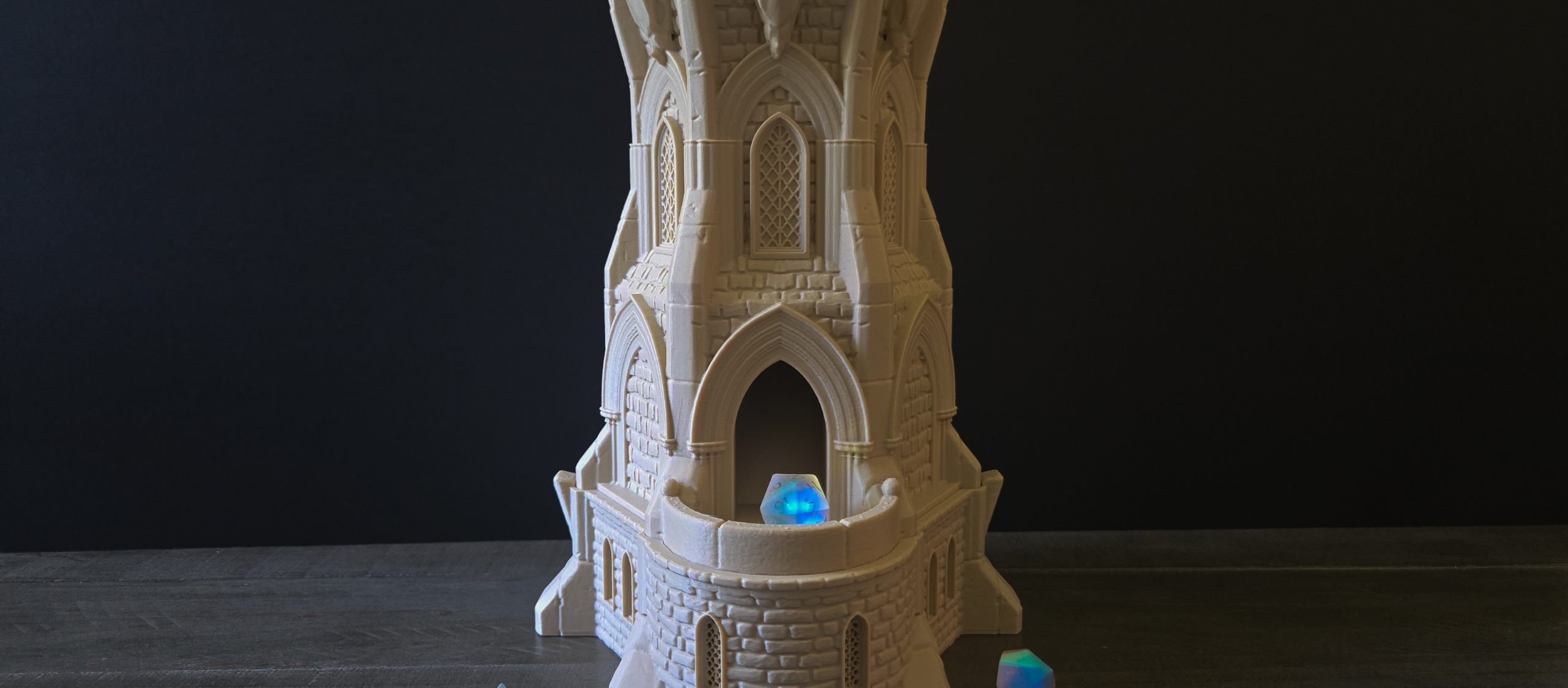 Detailed DnD dice towers and terrain pieces, including intricate designs like the Skull King and the 3-Story Inn
