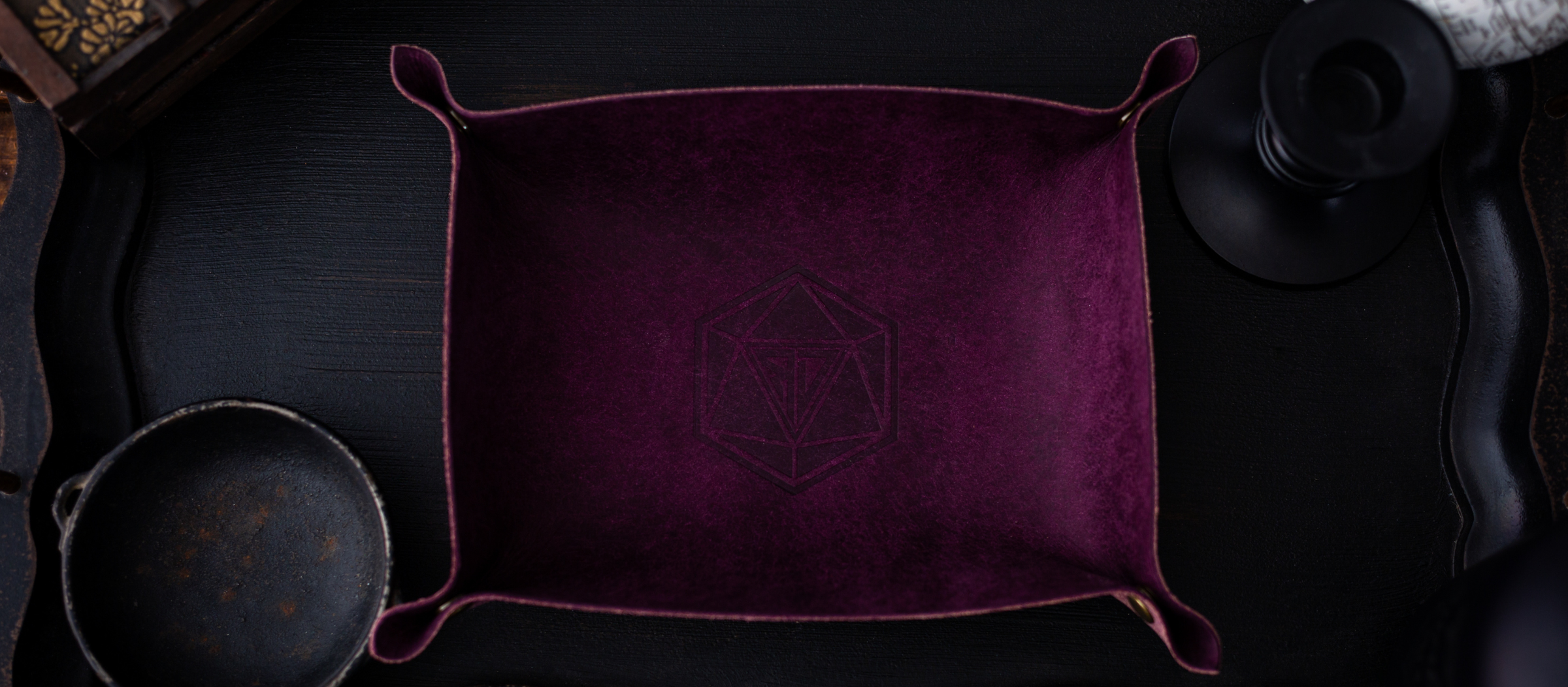 Discover premium dice trays for smooth rolls and control, available in leather and wooden designs with intricate patterns