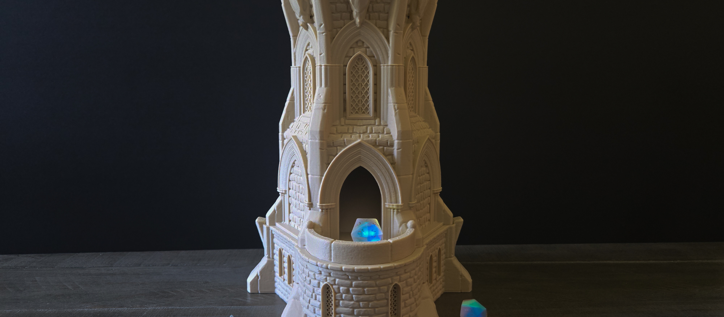 Detailed DnD dice towers and terrain pieces, including intricate designs like the Skull King and the 3-Story Inn